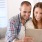 lifestyle image of a couple looking at a smart tablet